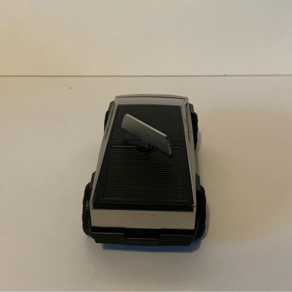 NIB. TESLA Cybertruck Wind-Up Racer